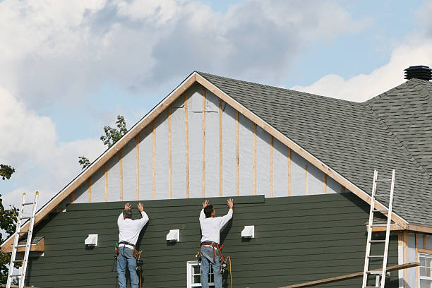 Professional Storm Damage Siding Repair technician working in Brookfield, IL